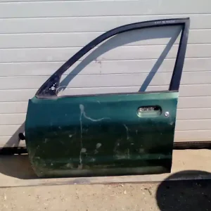 MAZDA 121 90.12.01-96.02.28 Bal első ajtó. bontott alkatrész Prémium